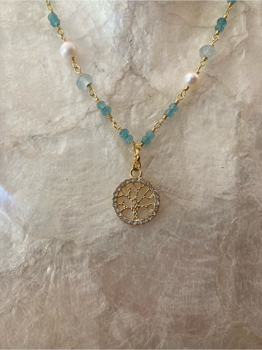Gold Tree of Life Pendant Necklace on rosary chain Blue stone Beads and Pearls.
